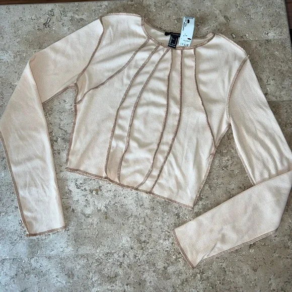 Nude Sunray Seam Ribbed Raw Hem Long Sleeve Crop Shirt - Picture 2 of 6